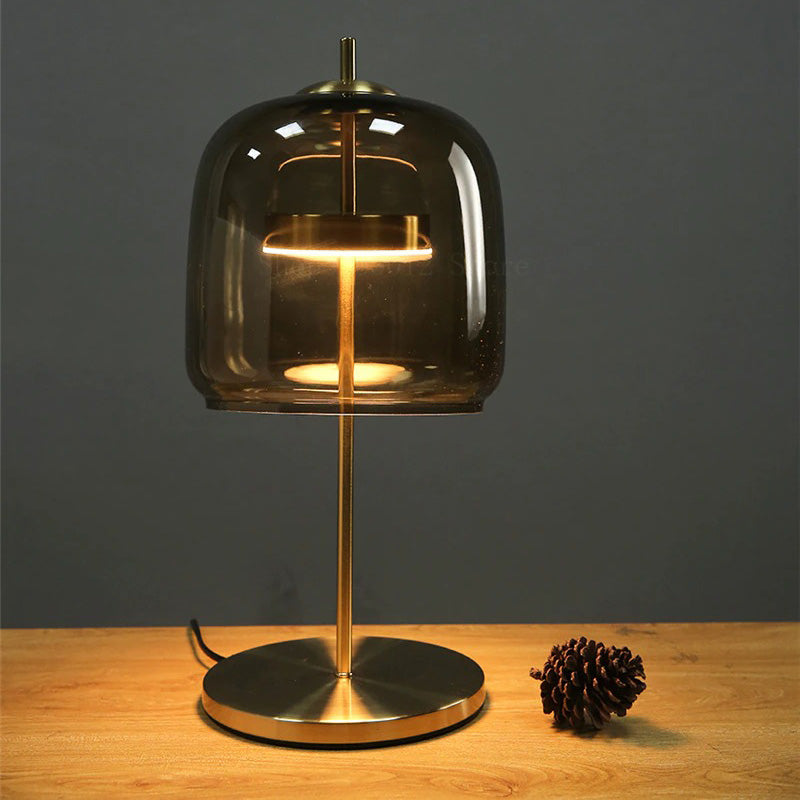 Design bedside lamp with glass shade