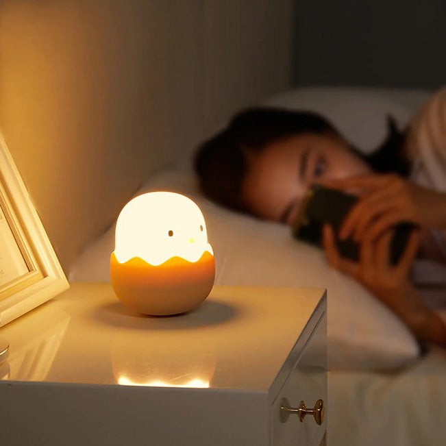 Egg-shaped bedside lamp for children