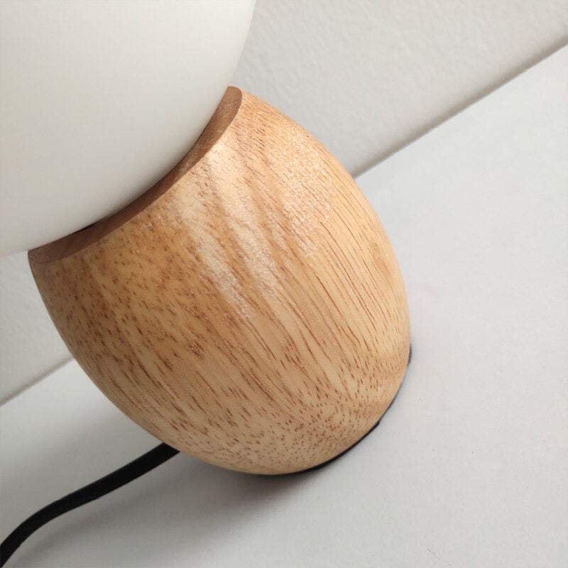 Wooden LED bedside lamp with sphere shade