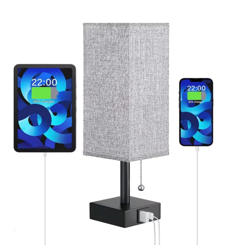 Table lamp with digital tablet and smartphone on a white background