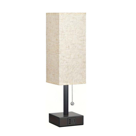 Table lamp with a beige rectangular shade on a white background