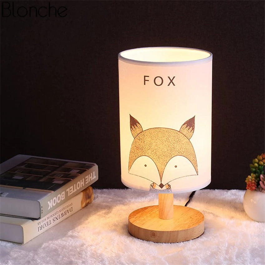 Wooden bedside lamp with animal shade