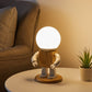 Humanoid wooden bedside lamp
