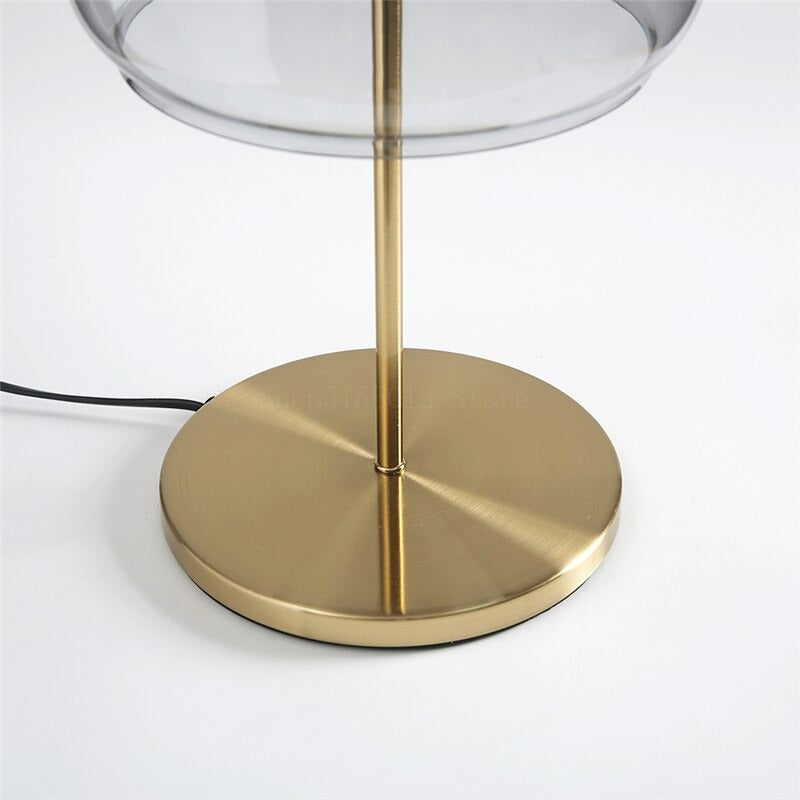 Design bedside lamp with glass shade