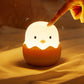 Egg-shaped bedside lamp for children