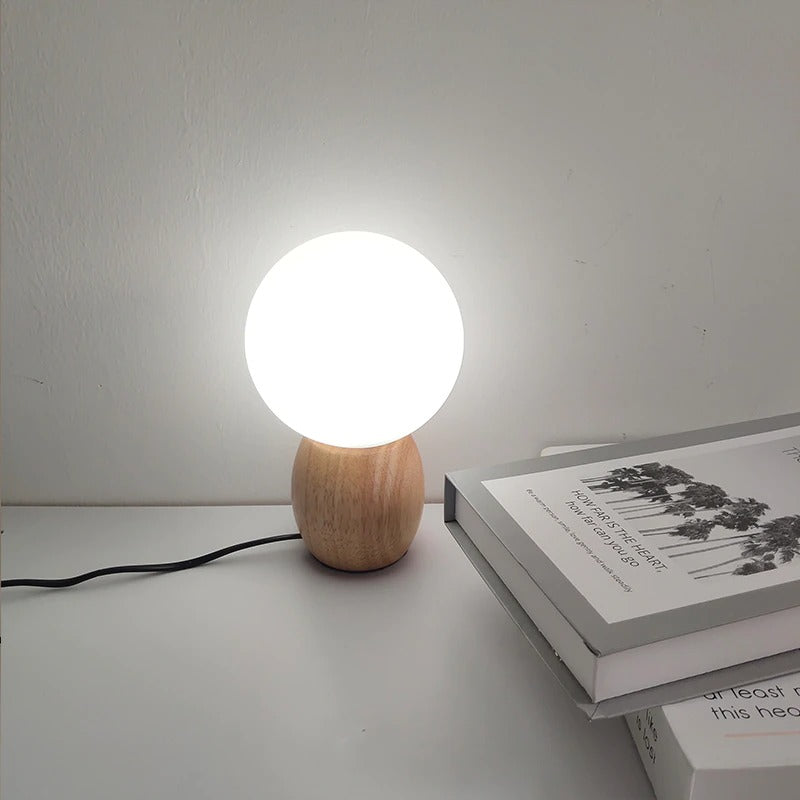 Wooden LED bedside lamp with sphere shade