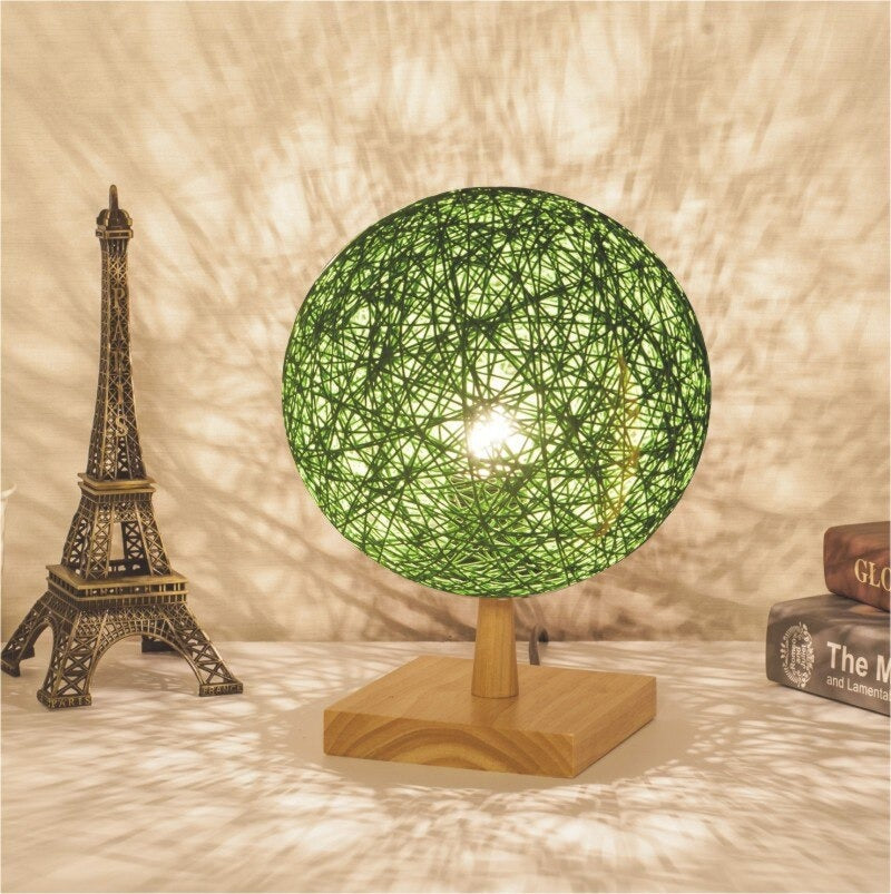 Rattan bedside lamp with wooden base