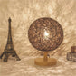 Rattan bedside lamp with wooden base