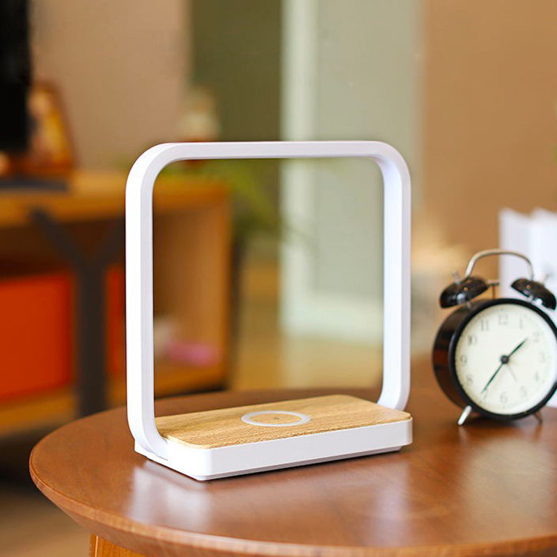 Touch-sensitive bedside lamp with wireless charger